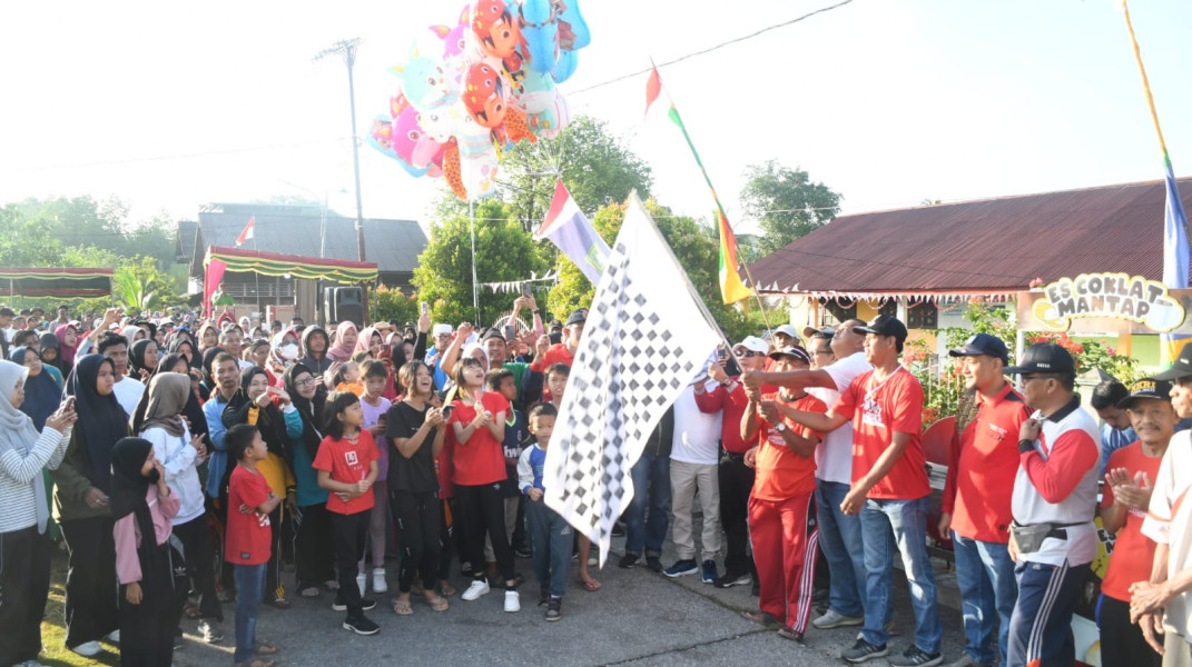 Semarak HUT Kemerdekaan RI,  Bupati Bengkalis Hadiri Jalan Santai dan Lomba Mancing di Lubuk Muda