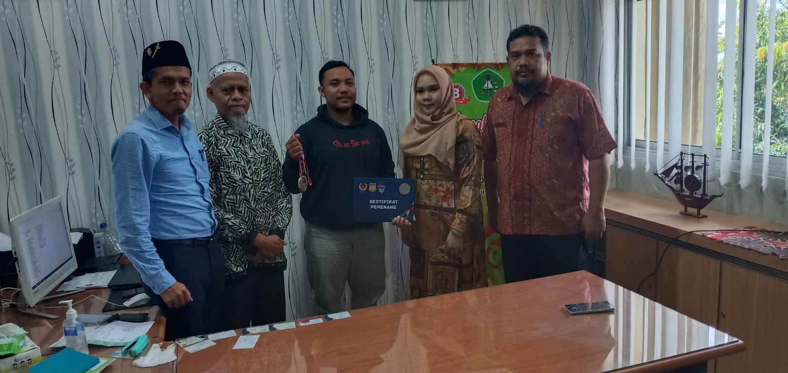 Mahasiswa Fekon Unilak Turut Sumbang Medali Bagi Riau Cabang Angkat Berat di PON Papua