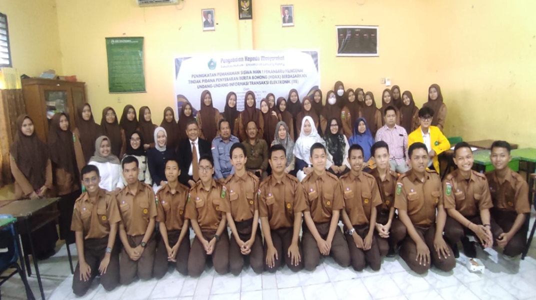 Dosen FH Unilak Melaksanakan PKM tentang Ketentuan Hukum Bagi Pengusaha Mudai MAN 1 Pekanbaru